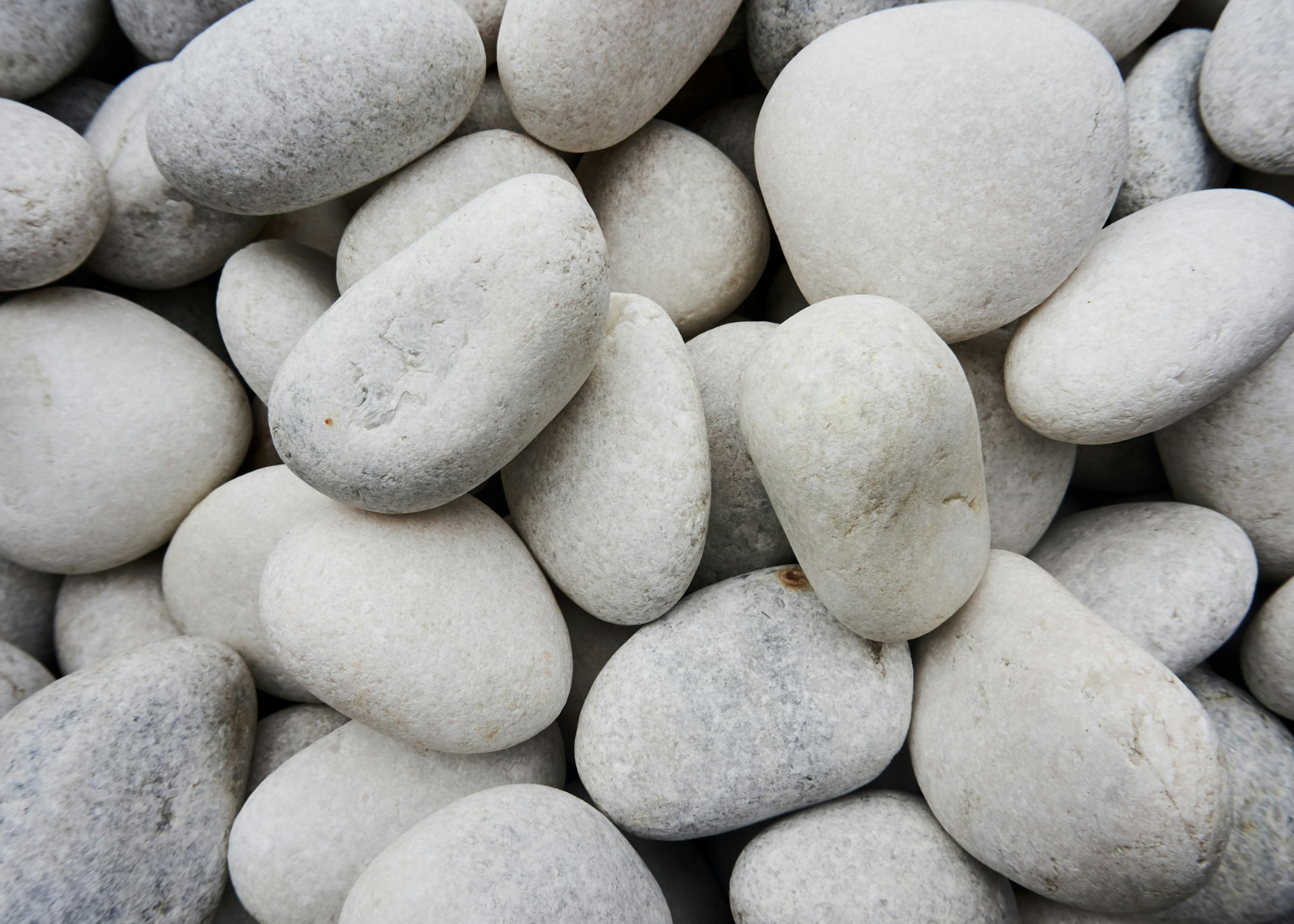 Smooth white stones arranged together